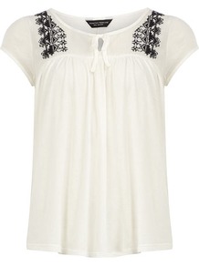 Ivory Peasant Top - pattern: plain; predominant colour: ivory; secondary colour: black; occasions: casual; length: standard; neckline: peep hole neckline; fibres: cotton - 100%; fit: loose; style: gypsy/peasant; shoulder detail: added shoulder detail; sleeve length: short sleeve; sleeve style: standard; texture group: cotton feel fabrics; bust detail: tiers/frills/bulky drapes/pleats; pattern type: fabric; embellishment: embroidered