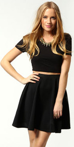 Sally Ribbed Skater Skirt - pattern: plain; fit: loose/voluminous; waist: high rise; predominant colour: black; occasions: casual, evening, work, holiday; length: just above the knee; style: fit & flare; fibres: polyester/polyamide - stretch; hip detail: soft pleats at hip/draping at hip/flared at hip; waist detail: narrow waistband; trends: volume; pattern type: fabric; texture group: jersey - stretchy/drapey