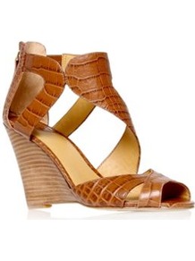 Missfitz - predominant colour: tan; occasions: casual, evening, holiday; material: leather; heel height: high; embellishment: zips; ankle detail: ankle strap; heel: wedge; toe: open toe/peeptoe; style: standard; finish: plain; pattern: animal print