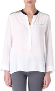 Eldorado Silk Blouse - pattern: plain; bust detail: pocket detail at bust; style: blouse; predominant colour: ivory; occasions: casual, evening, work; length: standard; neckline: mandarin with v-neck; fibres: silk - 100%; fit: body skimming; shoulder detail: added shoulder detail; back detail: longer hem at back than at front; sleeve length: long sleeve; sleeve style: standard; texture group: silky - light; pattern type: fabric
