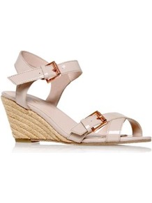 Malcolm - predominant colour: nude; occasions: casual, holiday; material: faux leather; heel height: mid; embellishment: buckles; ankle detail: ankle strap; heel: wedge; toe: open toe/peeptoe; style: standard; finish: patent; pattern: plain