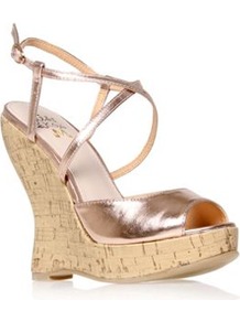 Maldiva - predominant colour: gold; occasions: casual, evening, holiday; material: faux leather; heel height: high; embellishment: buckles; ankle detail: ankle strap; heel: wedge; toe: open toe/peeptoe; style: strappy; trends: metallics; finish: metallic; pattern: plain