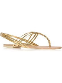 Persephone - predominant colour: gold; occasions: casual, evening, work, holiday; material: faux leather; heel height: flat; ankle detail: ankle strap; heel: standard; toe: toe thongs; style: flip flops / toe post; trends: metallics; finish: metallic; pattern: plain