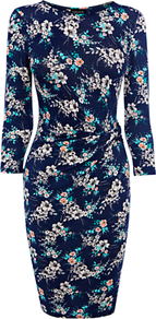 Floral Pattern Wrap Dress - style: faux wrap/wrap; neckline: round neck; waist detail: twist front waist detail/nipped in at waist on one side/soft pleats/draping/ruching/gathering waist detail; predominant colour: navy; occasions: casual, evening, work; length: just above the knee; fit: body skimming; fibres: polyester/polyamide - stretch; hip detail: ruching/gathering at hip; sleeve length: 3/4 length; sleeve style: standard; trends: high impact florals; pattern type: fabric; pattern size: small & busy; pattern: florals; texture group: jersey - stretchy/drapey