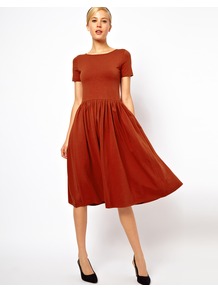 Midi Dress With Short Sleeves - length: below the knee; neckline: round neck; pattern: plain; waist detail: twist front waist detail/nipped in at waist on one side/soft pleats/draping/ruching/gathering waist detail; predominant colour: terracotta; occasions: casual, evening, work; fit: fitted at waist & bust; style: fit & flare; fibres: cotton - stretch; hip detail: soft pleats at hip/draping at hip/flared at hip; sleeve length: short sleeve; sleeve style: standard; pattern type: fabric; texture group: jersey - stretchy/drapey