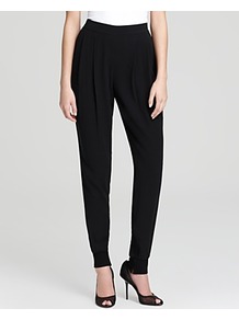 Ankle Pants With Cuffs - length: standard; pattern: plain; pocket detail: pockets at the sides; waist: mid/regular rise; predominant colour: black; occasions: casual, evening, work; fibres: silk - 100%; hip detail: front pleats at hip level; texture group: silky - light; fit: tapered; pattern type: fabric; style: standard