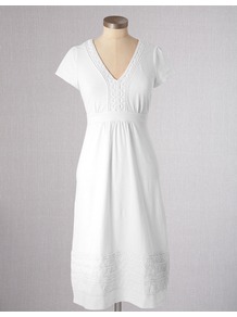 Fun Summer Dress - style: shift; neckline: v-neck; sleeve style: capped; fit: empire; pattern: plain; predominant colour: white; occasions: casual, holiday; length: just above the knee; fibres: cotton - stretch; sleeve length: short sleeve; texture group: cotton feel fabrics; pattern type: fabric