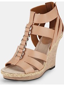 Wedge Sandals - predominant colour: nude; occasions: casual, evening, holiday; material: leather; heel height: high; ankle detail: ankle strap; heel: wedge; toe: open toe/peeptoe; style: gladiators; finish: plain; pattern: plain; embellishment: chain/metal