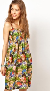 Bold Floral Sundress - neckline: high square neck; sleeve style: spaghetti straps; fit: loose; style: sundress; waist detail: twist front waist detail/nipped in at waist on one side/soft pleats/draping/ruching/gathering waist detail; bust detail: ruching/gathering/draping/layers/pintuck pleats at bust; occasions: casual; length: just above the knee; fibres: cotton - 100%; predominant colour: multicoloured; sleeve length: sleeveless; texture group: cotton feel fabrics; trends: high impact florals; pattern type: fabric; pattern size: big & busy; pattern: florals