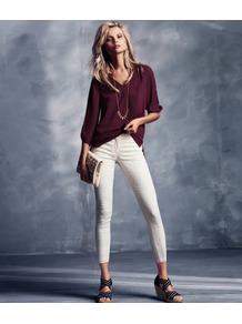 Trousers - pattern: plain, patterned/print; waist detail: fitted waist, narrow waistband; pocket detail: traditional 5 pocket; waist: mid/regular rise; predominant colour: ivory; occasions: casual, evening, work, holiday; length: ankle length; fibres: cotton - stretch; hip detail: fitted at hip (bottoms); fit: skinny/tight leg; pattern type: fabric; pattern size: standard; texture group: woven light midweight; style: standard