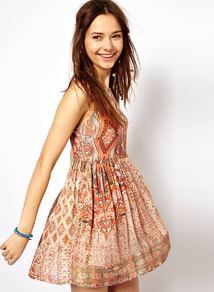 Tribal Print Dress - length: mid thigh; neckline: round neck; sleeve style: sleeveless; waist detail: twist front waist detail/nipped in at waist on one side/soft pleats/draping/ruching/gathering waist detail; occasions: casual, evening, holiday; fit: fitted at waist & bust; style: fit & flare; fibres: viscose/rayon - 100%; hip detail: sculpting darts/pleats/seams at hip; predominant colour: multicoloured; sleeve length: sleeveless; pattern type: fabric; pattern size: big & busy; pattern: patterned/print; texture group: other - light to midweight