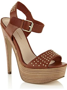 Tan Martini Platform Sandal - predominant colour: tan; occasions: evening, holiday; material: leather; heel height: high; embellishment: studs; ankle detail: ankle strap; heel: platform; toe: open toe/peeptoe; style: standard; finish: patent; pattern: plain