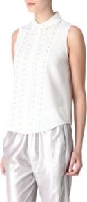 Calice Sleeveless Blouse - neckline: shirt collar/peter pan/zip with opening; sleeve style: sleeveless; style: blouse; back detail: contrast pattern/fabric at back; predominant colour: white; occasions: casual, evening, work; length: standard; fibres: polyester/polyamide - mix; fit: straight cut; bust detail: contrast pattern/fabric/detail at bust; sleeve length: sleeveless; texture group: lace; pattern type: fabric; pattern size: small & light; pattern: patterned/print; embellishment: beading