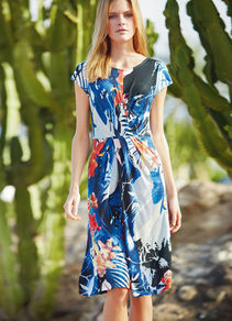 Jersey Dress - style: shift; neckline: round neck; waist detail: twist front waist detail/nipped in at waist on one side/soft pleats/draping/ruching/gathering waist detail; predominant colour: black; occasions: casual, occasion; length: on the knee; fit: body skimming; sleeve length: short sleeve; sleeve style: standard; trends: statement prints; pattern type: fabric; pattern size: standard; pattern: patterned/print; texture group: jersey - stretchy/drapey; fibres: viscose/rayon - mix