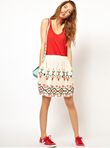 Embroidered Skirt - style: full/prom skirt; fit: loose/voluminous; waist detail: elasticated waist; waist: mid/regular rise; predominant colour: white; occasions: casual, holiday; length: just above the knee; fibres: cotton - 100%; hip detail: contrast fabric/print detail at hip; texture group: lace; pattern type: fabric; pattern size: standard; pattern: patterned/print; embellishment: embroidered