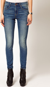 Distressed High Rise Skinny Jeans - style: skinny leg; length: standard; pattern: plain; waist: high rise; pocket detail: traditional 5 pocket; predominant colour: denim; occasions: casual; fibres: cotton - stretch; jeans detail: shading down centre of thigh; texture group: denim; pattern type: fabric