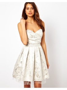 Metallic Prom Dress - neckline: strapless (straight/sweetheart); pattern: plain; style: prom dress; sleeve style: strapless; waist detail: fitted waist; predominant colour: silver; occasions: evening, occasion; length: just above the knee; fit: fitted at waist & bust; fibres: polyester/polyamide - 100%; hip detail: structured pleats at hip; sleeve length: sleeveless; texture group: structured shiny - satin/tafetta/silk etc.; pattern type: fabric; pattern size: small & light