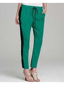 Pants Track - pattern: vertical stripes; style: tracksuit pants; pocket detail: pockets at the sides; waist detail: belted waist/tie at waist/drawstring; waist: mid/regular rise; predominant colour: emerald green; occasions: casual, evening, occasion; length: ankle length; fibres: silk - 100%; hip detail: fitted at hip (bottoms); texture group: silky - light; trends: sporty redux; fit: tapered; pattern type: fabric; pattern size: standard
