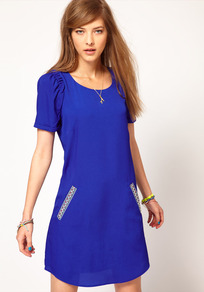 Shift Dress With Aztec Pockets - style: shift; length: mid thigh; neckline: round neck; pattern: plain; hip detail: side pockets at hip; predominant colour: royal blue; occasions: casual; fit: body skimming; fibres: polyester/polyamide - 100%; shoulder detail: flat/draping pleats/ruching/gathering at shoulder; sleeve length: short sleeve; sleeve style: standard; pattern type: fabric; texture group: other - light to midweight