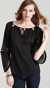 Etta Bead Sleeve Tunic - neckline: slash/boat neckline; pattern: plain; style: tunic; predominant colour: black; occasions: casual; length: standard; fit: body skimming; sleeve length: 3/4 length; sleeve style: standard; texture group: silky - light; pattern type: fabric; fibres: silk - stretch