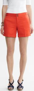 Heritage Buckle Tab Short - pattern: plain; style: shorts; pocket detail: small back pockets; length: short shorts; waist: mid/regular rise; predominant colour: bright orange; occasions: casual, holiday; fibres: cotton - stretch; jeans & bottoms detail: turn ups; texture group: cotton feel fabrics; fit: slim leg; pattern type: fabric