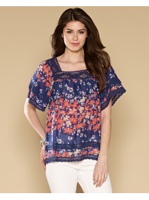 Millie Print Top - sleeve style: dolman/batwing; predominant colour: navy; secondary colour: coral; occasions: casual, holiday; length: standard; style: top; fibres: cotton - 100%; fit: loose; bust detail: contrast pattern/fabric/detail at bust; sleeve length: short sleeve; texture group: cotton feel fabrics; neckline: low square neck; pattern type: fabric; pattern size: small & busy; pattern: florals; embellishment: lace