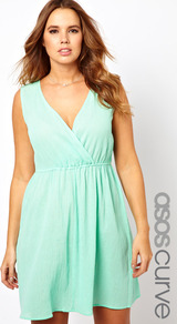 Curve Exclusive Skater Dress In Cheesecloth - style: faux wrap/wrap; neckline: low v-neck; fit: fitted at waist; pattern: plain; sleeve style: sleeveless; waist detail: twist front waist detail/nipped in at waist on one side/soft pleats/draping/ruching/gathering waist detail; predominant colour: pistachio; occasions: casual, holiday; length: just above the knee; fibres: cotton - 100%; hip detail: soft pleats at hip/draping at hip/flared at hip; sleeve length: sleeveless; texture group: cotton feel fabrics; pattern type: fabric