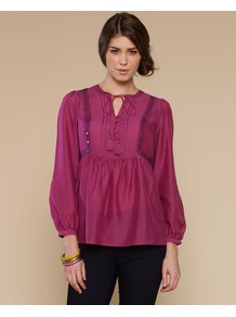 Sienna Silk Cotton Blouse - pattern: plain; sleeve style: balloon; style: blouse; waist detail: twist front waist detail/nipped in at waist on one side/soft pleats/draping/ruching/gathering waist detail; bust detail: buttons at bust (in middle at breastbone)/zip detail at bust; predominant colour: purple; occasions: casual, holiday; length: standard; neckline: peep hole neckline; fibres: cotton - mix; fit: empire; shoulder detail: added shoulder detail; sleeve length: long sleeve; texture group: cotton feel fabrics; pattern type: fabric; embellishment: embroidered
