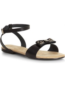 Black Stud Leather Bow Sandals - predominant colour: black; occasions: casual, holiday; material: leather; heel height: flat; ankle detail: ankle strap; heel: standard; toe: open toe/peeptoe; style: standard; finish: plain; pattern: plain; embellishment: bow