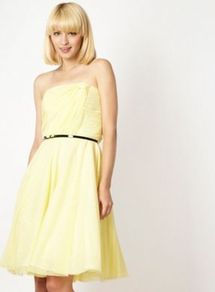 Designer Yellow Strapless Mesh Prom Dress - neckline: strapless (straight/sweetheart); style: prom dress; sleeve style: strapless; waist detail: belted waist/tie at waist/drawstring; bust detail: ruching/gathering/draping/layers/pintuck pleats at bust; predominant colour: primrose yellow; occasions: evening, occasion; length: just above the knee; fit: fitted at waist & bust; fibres: polyester/polyamide - 100%; sleeve length: sleeveless; trends: volume