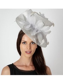 Designer Silver Twist Feather Hair Piece - predominant colour: silver; occasions: occasion; type of pattern: heavy; style: wide brimmed; size: large; material: sinamay; embellishment: feather; pattern: plain