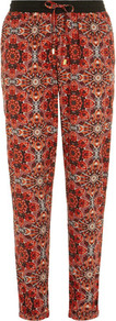 Orange Kaleidoscope Patterned Jogger - length: standard; style: tracksuit pants; pocket detail: pockets at the sides; waist detail: belted waist/tie at waist/drawstring; waist: mid/regular rise; predominant colour: coral; secondary colour: black; occasions: casual, evening, holiday; fibres: polyester/polyamide - 100%; hip detail: front pleats at hip level; texture group: crepes; trends: modern geometrics; fit: tapered; pattern type: fabric; pattern size: big & busy; pattern: patterned/print