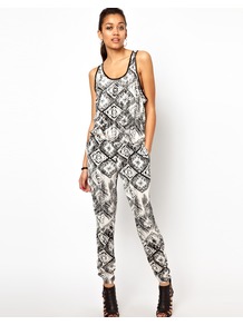 Tribal Print Jumpsuit - length: standard; sleeve style: sleeveless; hip detail: side pockets at hip; occasions: casual, evening, holiday; fit: body skimming; neckline: scoop; fibres: polyester/polyamide - 100%; sleeve length: sleeveless; predominant colour: monochrome; style: jumpsuit; pattern type: fabric; pattern size: big & busy; pattern: patterned/print; texture group: other - light to midweight