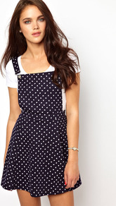 Pinny Bib Dress - length: mid thigh; sleeve style: standard vest straps/shoulder straps; fit: fitted at waist; style: dungaree dress; pattern: polka dot; secondary colour: white; predominant colour: navy; occasions: casual; fibres: cotton - stretch; hip detail: soft pleats at hip/draping at hip/flared at hip; back detail: crossover; sleeve length: sleeveless; neckline: low square neck; pattern type: fabric; pattern size: small & busy; texture group: jersey - stretchy/drapey