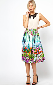Midi Skirt In New Floral Print - length: below the knee; style: full/prom skirt; fit: loose/voluminous; waist detail: fitted waist; waist: mid/regular rise; predominant colour: pale blue; secondary colour: emerald green; occasions: casual, work; fibres: cotton - stretch; hip detail: soft pleats at hip/draping at hip/flared at hip; trends: high impact florals; pattern type: fabric; pattern size: small & busy; pattern: florals; texture group: jersey - stretchy/drapey