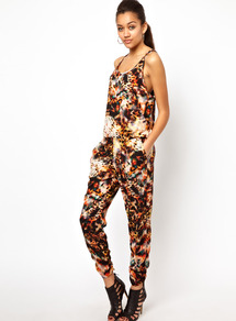 Animal Print Jumpsuit - sleeve style: standard vest straps/shoulder straps; fit: fitted at waist; waist detail: elasticated waist; occasions: casual, evening; length: ankle length; neckline: scoop; fibres: polyester/polyamide - 100%; predominant colour: multicoloured; sleeve length: sleeveless; texture group: crepes; trends: statement prints; style: jumpsuit; pattern type: fabric; pattern size: big & busy; pattern: animal print