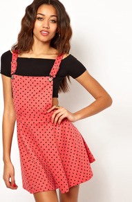 Pinny Bib Dress - length: mid thigh; sleeve style: standard vest straps/shoulder straps; style: dungaree dress; back detail: low cut/open back; pattern: polka dot; predominant colour: coral; secondary colour: black; occasions: casual, holiday; fit: soft a-line; fibres: polyester/polyamide - stretch; hip detail: soft pleats at hip/draping at hip/flared at hip; sleeve length: sleeveless; neckline: low square neck; pattern type: fabric; pattern size: light/subtle; texture group: other - light to midweight