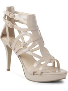 Bronnie Faux Leather Sandals - predominant colour: ivory; occasions: evening, occasion, holiday; material: leather; heel height: high; embellishment: buckles; ankle detail: ankle strap; heel: platform; toe: open toe/peeptoe; style: strappy; finish: patent; pattern: plain