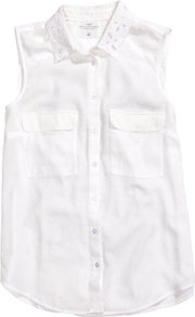 Sleeveless Blouse - neckline: shirt collar/peter pan/zip with opening; pattern: plain; sleeve style: sleeveless; bust detail: pocket detail at bust; style: blouse; predominant colour: white; occasions: casual, evening, work, holiday; length: standard; fibres: cotton - 100%; fit: straight cut; sleeve length: sleeveless; texture group: cotton feel fabrics; pattern type: fabric; embellishment: sequins