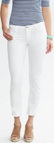 White Skinny Roll Up Jean - style: skinny leg; pattern: plain; waist: low rise; pocket detail: traditional 5 pocket; predominant colour: white; occasions: casual, evening, holiday; length: ankle length; fibres: cotton - stretch; jeans & bottoms detail: turn ups; texture group: denim; pattern type: fabric