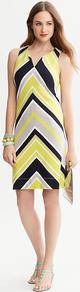 Milly Collection Sleeveless Chevron Stripe Dress - style: shift; neckline: v-neck; sleeve style: sleeveless; pattern: striped; predominant colour: primrose yellow; secondary colour: black; occasions: casual, evening, work, holiday; length: just above the knee; fit: body skimming; fibres: viscose/rayon - stretch; sleeve length: sleeveless; trends: glamorous day shifts; pattern type: fabric; pattern size: big & busy; texture group: other - light to midweight