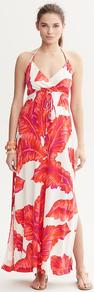 Milly Collection Banana Leaf Print Dress - fit: empire; sleeve style: sleeveless; style: maxi dress; length: ankle length; neckline: halter neck; back detail: low cut/open back; predominant colour: white; secondary colour: bright orange; occasions: evening, holiday; fibres: silk - mix; sleeve length: sleeveless; texture group: silky - light; trends: high impact florals; pattern type: fabric; pattern size: big & busy; pattern: patterned/print