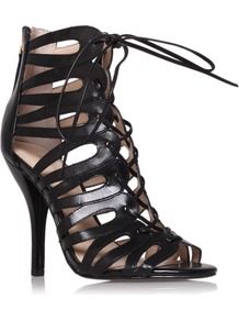 Kenie - predominant colour: black; occasions: evening, occasion, holiday; material: leather; heel height: high; embellishment: zips; ankle detail: ankle tie; heel: stiletto; toe: open toe/peeptoe; style: strappy; finish: plain; pattern: plain
