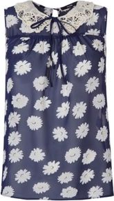 Daisy Print Sleeveless Chiffon Top With Crochet And Pearlescent Violet - sleeve style: sleeveless; bust detail: added detail/embellishment at bust; secondary colour: white; predominant colour: navy; occasions: casual, evening, holiday; length: standard; style: top; fibres: polyester/polyamide - 100%; fit: straight cut; neckline: no opening/shirt collar/peter pan; back detail: keyhole/peephole detail at back; sleeve length: sleeveless; texture group: sheer fabrics/chiffon/organza etc.; pattern type: fabric; pattern size: light/subtle; pattern: florals; embellishment: lace