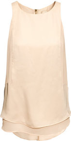 Sleeveless Satin Top - pattern: plain; sleeve style: sleeveless; style: vest top; predominant colour: nude; occasions: casual, evening, occasion, holiday; length: standard; fibres: polyester/polyamide - 100%; fit: loose; neckline: crew; back detail: longer hem at back than at front; sleeve length: sleeveless; texture group: silky - light; hip detail: ruffles/tiers/tie detail at hip; pattern type: fabric