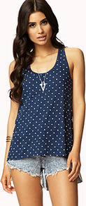 Polka Dot Racerback Tank - neckline: round neck; sleeve style: sleeveless; style: vest top; back detail: racer back/sports back; pattern: polka dot; waist detail: twist front waist detail/nipped in at waist on one side/soft pleats/draping/ruching/gathering waist detail; secondary colour: white; predominant colour: navy; occasions: casual, holiday; length: standard; fibres: cotton - 100%; fit: body skimming; hip detail: soft pleats at hip/draping at hip/flared at hip; sleeve length: sleeveless; pattern type: fabric; pattern size: standard; texture group: jersey - stretchy/drapey