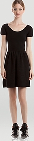 Short Sleeve Dress Rébus - length: mid thigh; pattern: plain; back detail: low cut/open back; waist detail: twist front waist detail/nipped in at waist on one side/soft pleats/draping/ruching/gathering waist detail; predominant colour: black; occasions: casual, evening; fit: fitted at waist & bust; style: fit & flare; neckline: scoop; fibres: cotton - stretch; sleeve length: short sleeve; sleeve style: standard; pattern type: fabric; texture group: jersey - stretchy/drapey