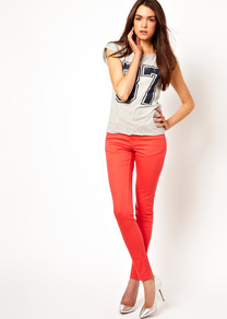 Jegging In Bright Peach - pattern: plain; style: jeggings; pocket detail: traditional 5 pocket; waist: mid/regular rise; predominant colour: coral; occasions: casual; length: ankle length; fibres: cotton - stretch; texture group: denim; pattern type: fabric