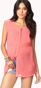 Pleated Georgette Tunic - neckline: round neck; pattern: plain; sleeve style: sleeveless; length: below the bottom; style: tunic; bust detail: ruching/gathering/draping/layers/pintuck pleats at bust; predominant colour: coral; occasions: casual, evening, holiday; fibres: polyester/polyamide - 100%; fit: straight cut; sleeve length: sleeveless; texture group: sheer fabrics/chiffon/organza etc.; pattern type: fabric