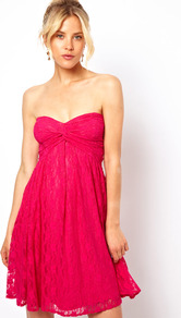 Pretty Lace Skater Dress - style: empire line; neckline: strapless (straight/sweetheart); fit: empire; pattern: plain; sleeve style: strapless; bust detail: knot twist front detail at bust; predominant colour: hot pink; occasions: evening, occasion; length: just above the knee; hip detail: soft pleats at hip/draping at hip/flared at hip; sleeve length: sleeveless; texture group: lace; trends: fluorescent; pattern type: fabric; fibres: nylon - stretch; embellishment: lace